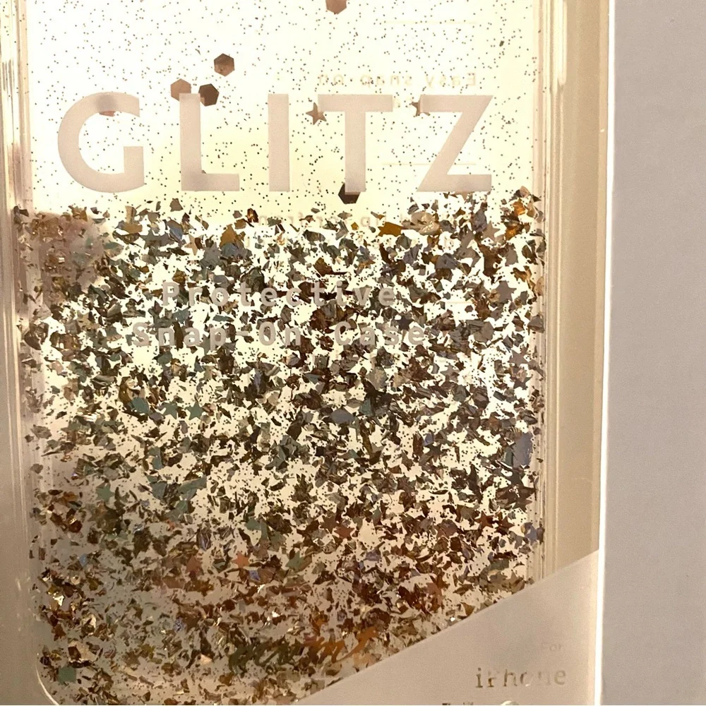 Cell phone cover fits iPhone 11 MVMT Glitz. Won’t slip out of your hand. NWT